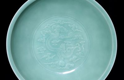 A Large Celadon ‘Dragon’ Dish, Yongzheng Mark and Period, 1723-1735