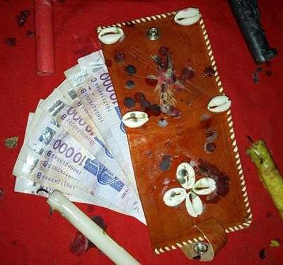 PORTE MONNAIE MAGIQUE A HAUTE PUISSANCE DU MAITRE MARABOUT AMANDJI HOUNDJO