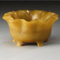A rare and unusual petal-rimmed rhinoceros horn footed bowl . Qing dynasty