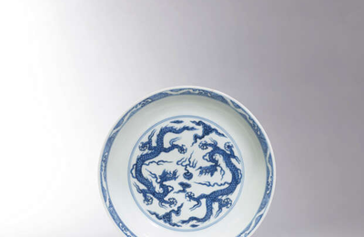 A very rare and exceptional blue and white ‘dragon’ dish, Hongzhi six-character mark and of the period (1488-1505)