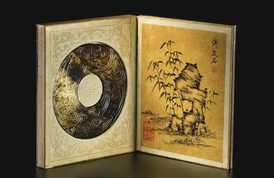A pair of Imperial albums by the Qianlong emperor after Ni Zan, inset with jade discs, Qing dynasty, Qianlong period