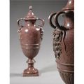 A large pair of Italian carved Egyptian porphyry vases and covers, late 18th/first half 19th century