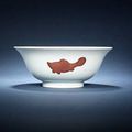 Two copper-red 'three fish' bowls & a pair of dishes. Yongzheng six-character mark and of the period
