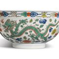 A wucai 'Dragon and Phoenix' bowl, Qianlong seal mark and period (1736-1795)