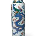A large and unusual wucai cylindrical 'dragon' vase, Transitional period, mid-17th century