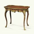 Table en cabaret en noyer, hêtre teinté et monture de bronze doré, travail allemand, probablement Berlin, milieu du XVIIIe siècl