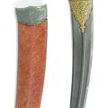 A Mughal jade-hilted dagger (khanjar) with scabbard, India, 18th century
