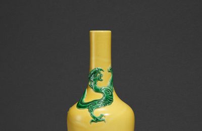 A yellow-ground green-enamelled 'chilong' bottle vase, Kangxi mark, possibly later