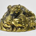 A rare gilt-bronze 'mythical beast' weight, Western Han dynasty