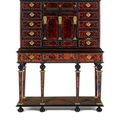 A Flemish 17th century gilt-metal and brass-mounted, ivory-inlaid tortoiseshell, rosewood, ebony and ebonised cabinet on stand