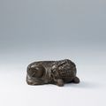 A small bronze lion-form weight, Ming dynasty (1368-1644)