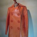 V120 : Veste vinyl orange 60's T.40