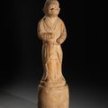 A rare documentary pottery figure of a groom, Late Tang Dynasty, dated by inscription to 868 AD and of the period