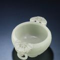 A finely carved white jade 'marriage' bowl, Qianlong period (1736-1795)