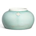 An Extremely Rare Pale Celadon-Glazed Compressed Globular Jar, Yongle Period (1403-1425)