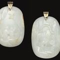 A white and russet jade figural group pendant, 19th century