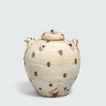 A spotted celadon ewer and lid, Trần dynasty, 13th-14th century