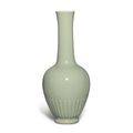 A rare celadon-glazed 'chrysanthemum' bottle vase, Mark and period of Kangxi (1662-1722)