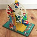 1 roue musicale Fisher Price 