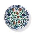 An extremely large and impressive Iznik pottery dish, Ottoman Turkey, circa 1590