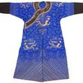 A blue silk gauze dragon robe with couched gold thread dragon motifs and black cuffs, China, Guangxu period