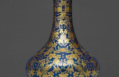 An imperial blue-ground gilt-decorated 'Butterfly and gourd' vase, Jiaqing six-character seal mark in iron red and of the period