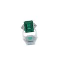 Attractive emerald and diamond ring