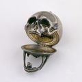 Silver cased verge watch in the form of a skull, c.1650