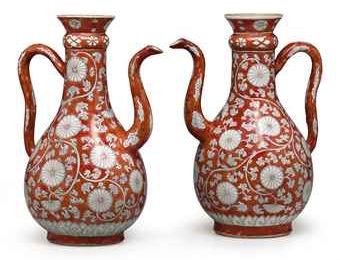 A large pair of iron-red ewers. Kangxi period &  rare "clobbered" copper red vase, 18th century