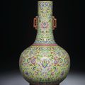 A fine lime-green ground famille-rose bottle vase, Jiaqing iron red six-character seal mark and of the period (1796-1820)