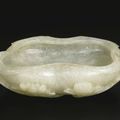 A white jade lotus leaf-form brushwasher, Qing Dynasty, 18th century