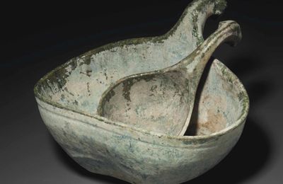 An unusual green-glazed red pottery model of an yi and ladle, Eastern Han dynasty (AD 25-220)