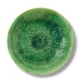 A molded green-glazed dish, Liao dynasty (907-1125)
