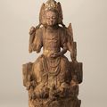 A wood figure of a three-faced and six-armed Guanyin, Dali kingdom, 12th century