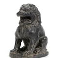 A black stone figure of a lion, Tang Dynasty 