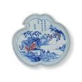 A rare blue and white and copper-red peach-shaped dish, Early Kangxi period (1662-1722)