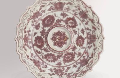 A rare copper-red decorated ‘chrysanthemum scroll’ barbed-rim cup stand, Hongwu period (1368-1398)