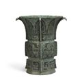 An inscribed archaic bronze ritual wine vessel (Zun), Late Shang dynasty