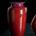 A fine copper-red and purple-glazed vase with lion mask handles, 19th century