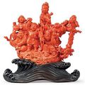 A Chinese carved coral figural group. 19th century 