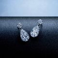 A Pair of 10.15 and 10.05 Carat, D Colour, Type IIa, Flawless, Diamond Ear Pendants