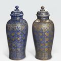 A rare pair of massive powder-blue and gilt vases and covers, Kangxi period