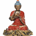 A rare Jun-type glazed figure of Buddha, 18th century, the European ormolu mount 19th century