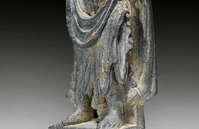 A small grey schist torso of a Bodhisattva. Gandhara, 3rd-4th century