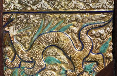 An Ilkhanid moulded cobalt-blue, turquoise and lustre decorated pottery tile, from Takht-I Sulayman, West Iran, circa 1270-80