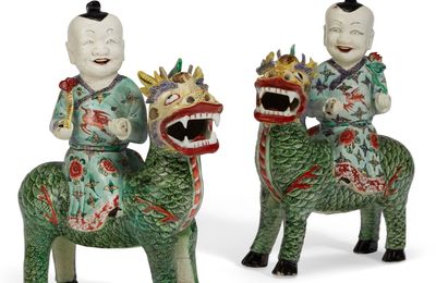 A pair of Chinese Export porcelain famille verte figures of boys riding qilin, Kangxi period (1662-1722)