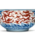 A rare and large iron-red and blue 'dragon' bowl, Jiajing mark and period (1522-1566)