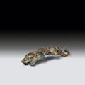 A bronze tiger-shaped belt hook, Han dynasty (206 BC-220 AD)