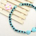 Comment faire un frais collier de pendentif papillon avec des perles de turquoise