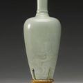 A fine and rare celadon-glazed ‘Dragon’ vase, Kangxi mark and period (1662-1722)
